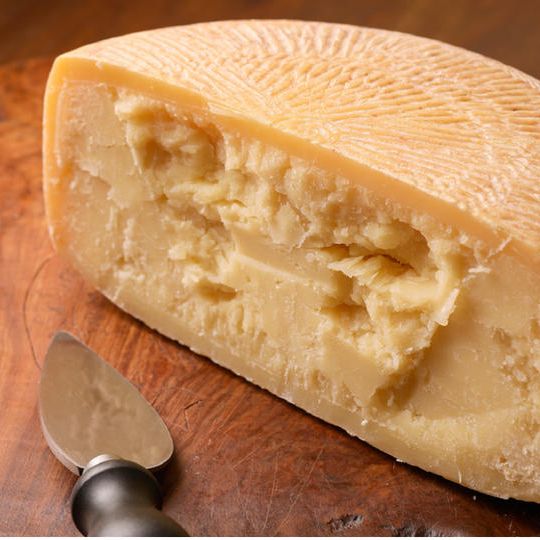 「グラナ・ディ・エゾ」1/2サイズ(約4キログラム)/ジョヴァンニ・グラツィアーノからの感謝状を添えて