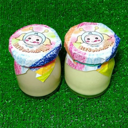 店舗で使用できる「まほちゃんのぷりん２個(プレーン味１個＋コーヒー味１個)」引換券